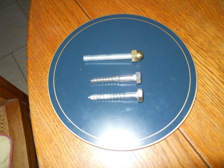 A Dome-Headed Bolt and Coach Screws