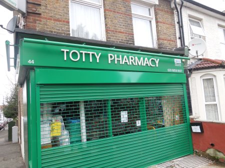 A Pharmacy With Young Assistants Wearing High Heels?