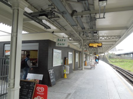 An Overground Station With On-Platform Cafe And Toilets