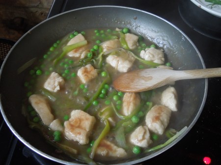 Cooking The Chicken And Peas