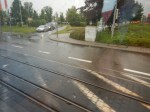 Trams And Trains Share A Level Crossing