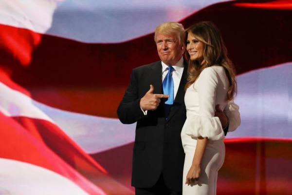 CLEVELAND, OH - JULY 18:  Presumptive Republican presidential nominee Donald Trump gestures to his wife Melania after she delivered a speech on the first day of the Republican National Convention on July 18, 2016 at the Quicken Loans Arena in Cleveland, Ohio. An estimated 50,000 people are expected in Cleveland, including hundreds of protesters and members of the media. The four-day Republican National Convention kicks off on July 18.  (Photo by Joe Raedle/Getty Images)